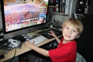 5-year-old grandson,computer whiz-taught himself to create a podcast group teaching Mindcraft.