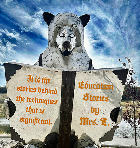 A large bear is reading a book entitled, Education Stories.