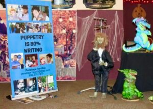 Did you know that puppetry is 80% writing? Sign at one of Penelope's demonstrations.