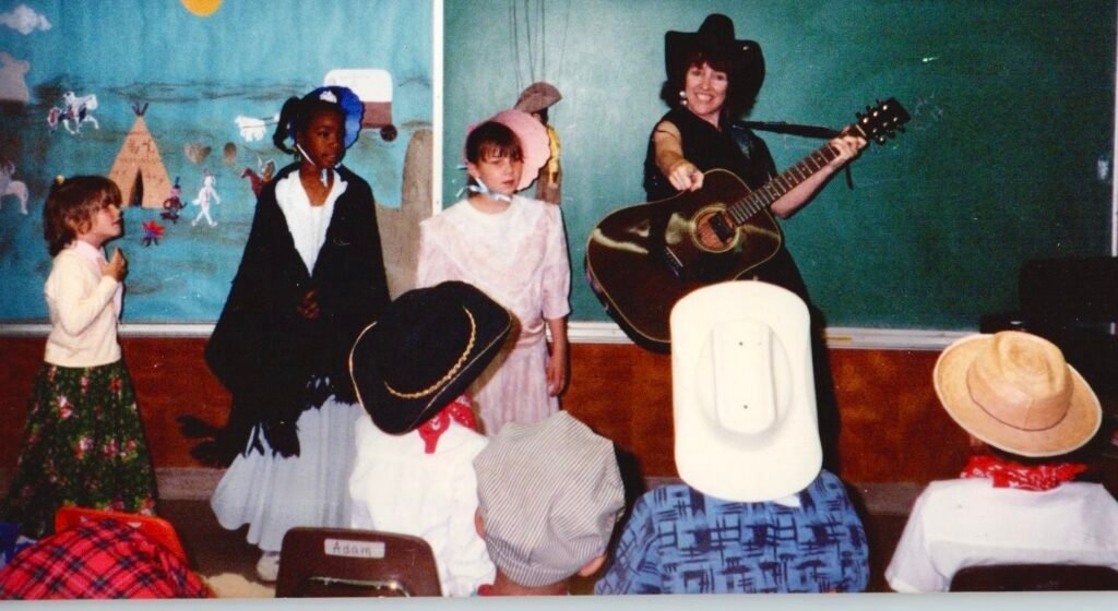 Penelope teaching challenged students folk songs and history.