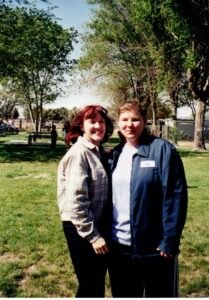Jaylene at nineteen, with her teacher, Mrs. T.